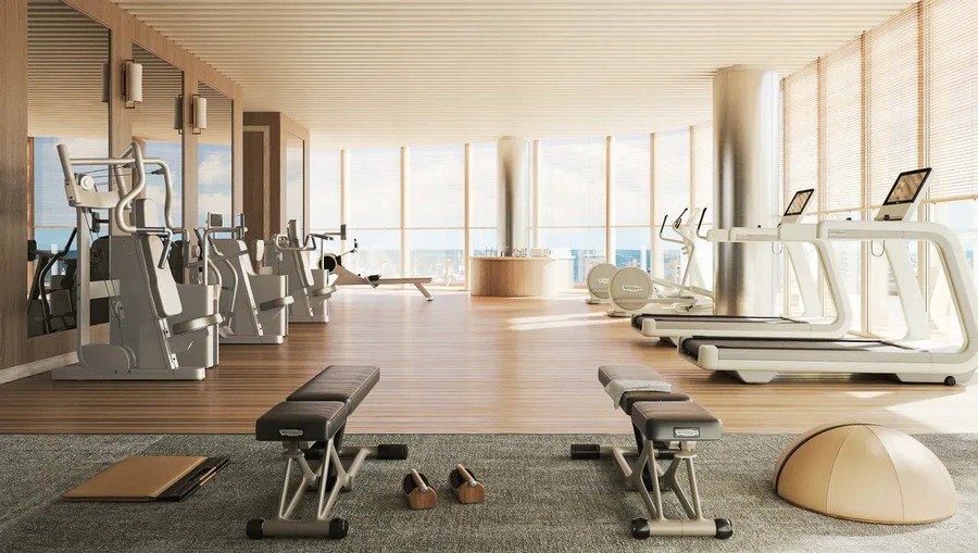 Four Seasons Private Residences Coconut Grove fitness center with floor-to-ceiling bay views