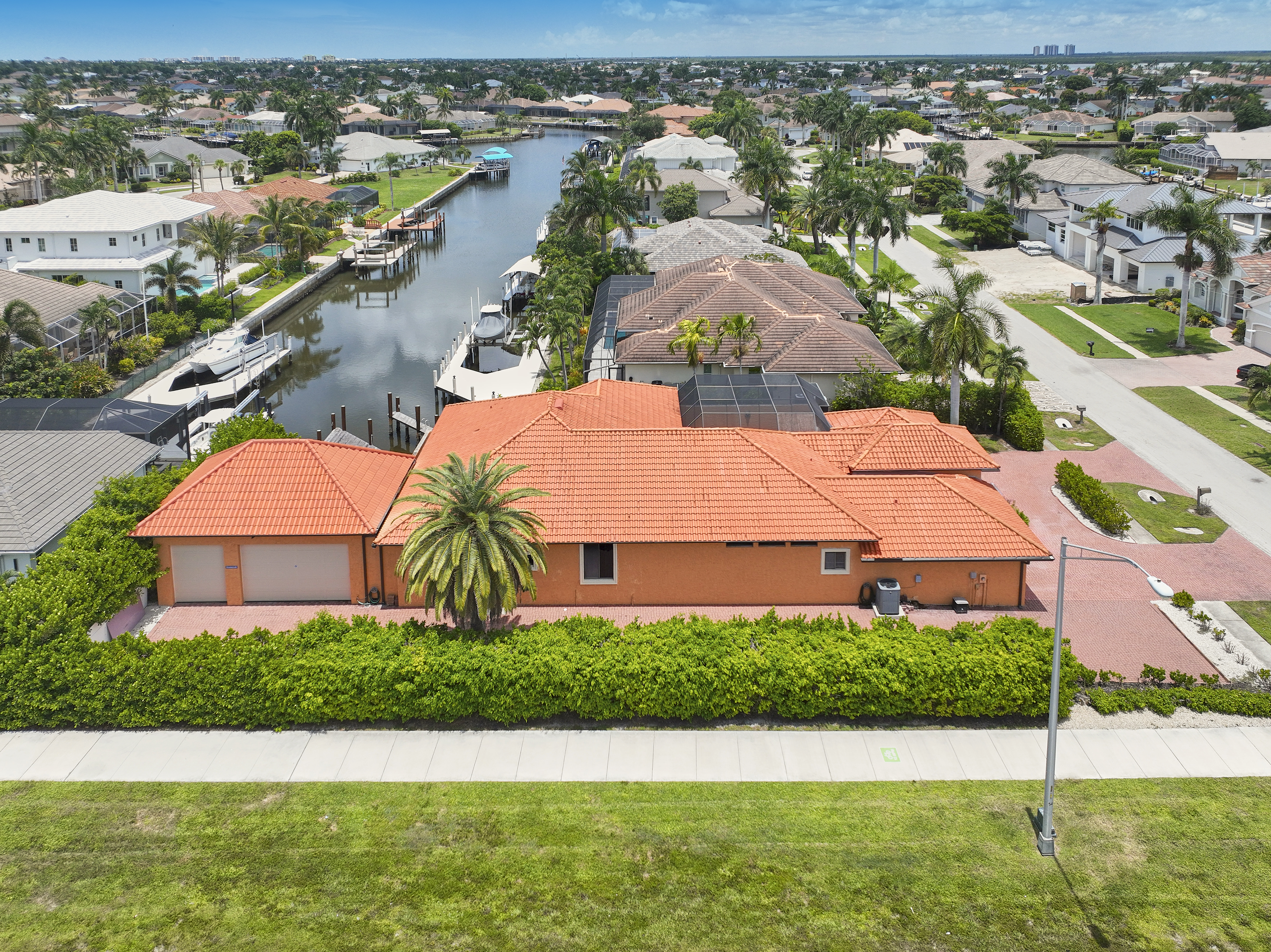 Chris Sullivan Presents A Sophisticated Waterfront Fortress In Marco Island
