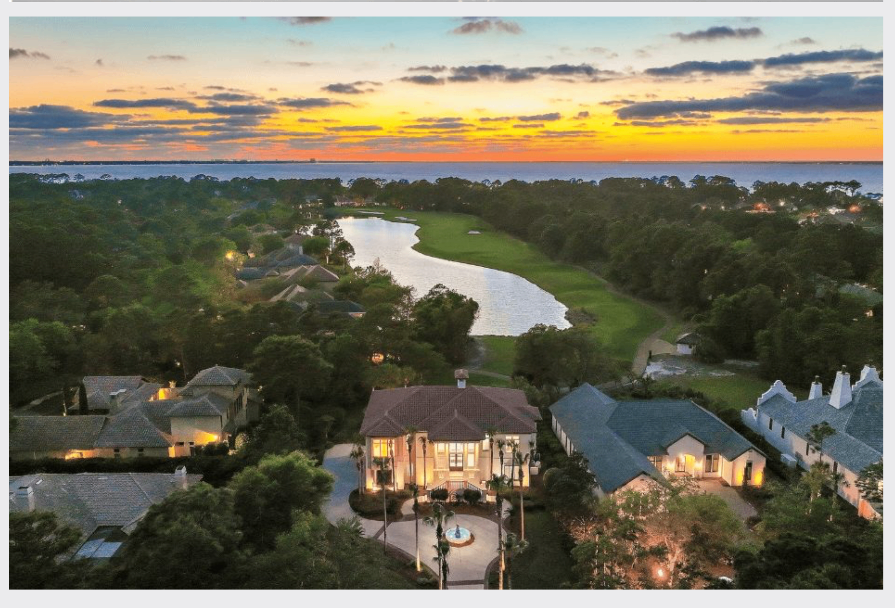 Aerial sunset view of the estate overlooking Burnt Pine golf course and Choctawhatchee Bay