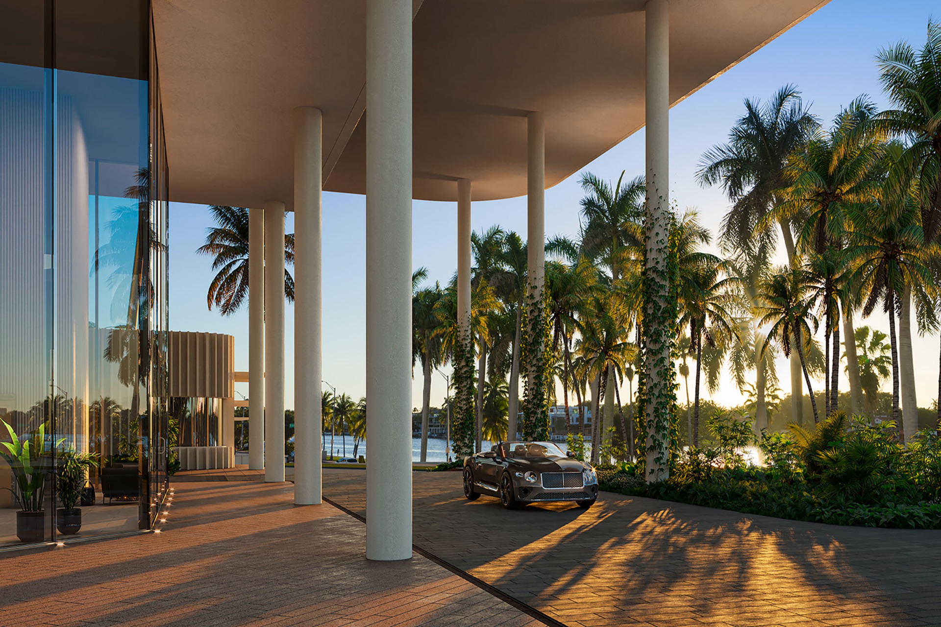Porte-cochère arrival at a Miami Beach luxury condominium at sunset