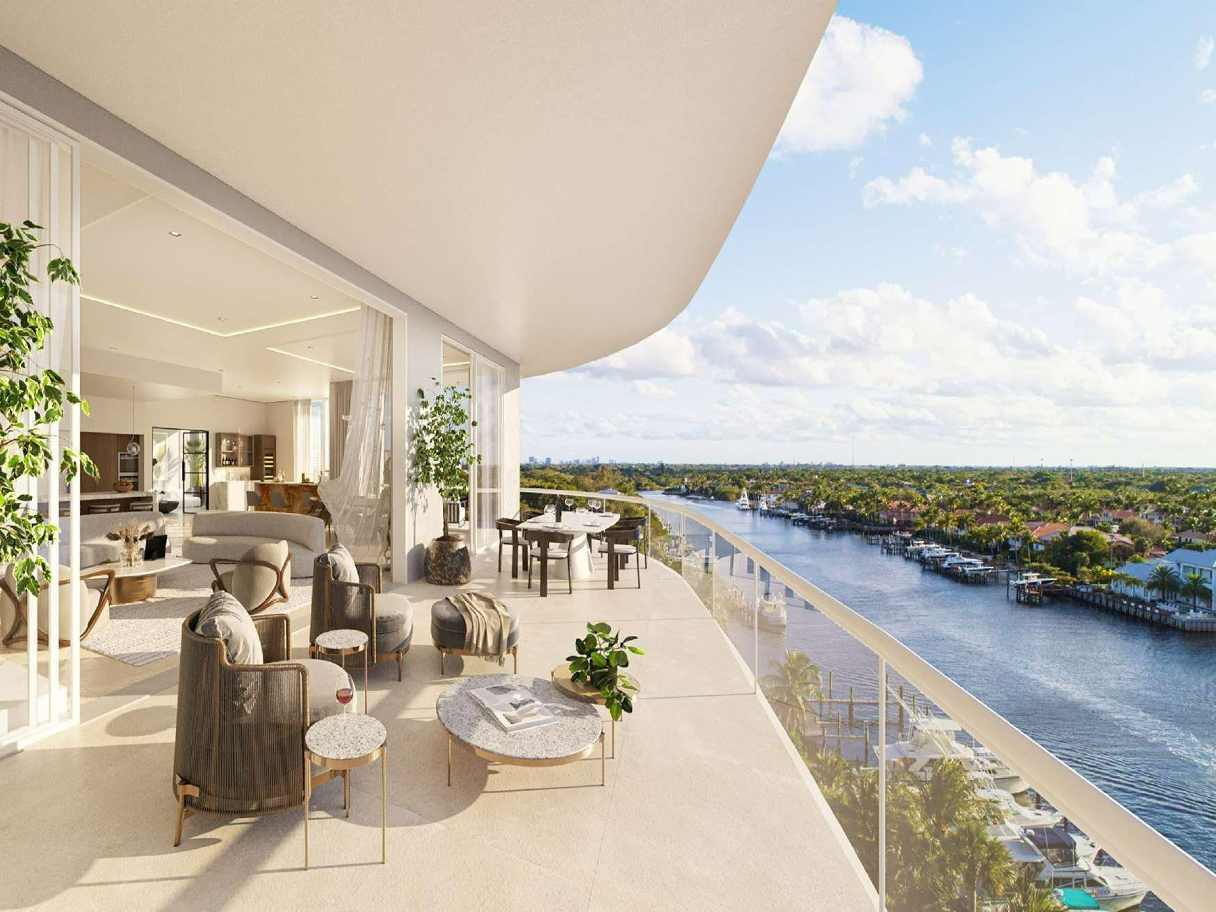 Pool deck and waterfront amenity area at The Ritz-Carlton Residences, Palm Beach Gardens