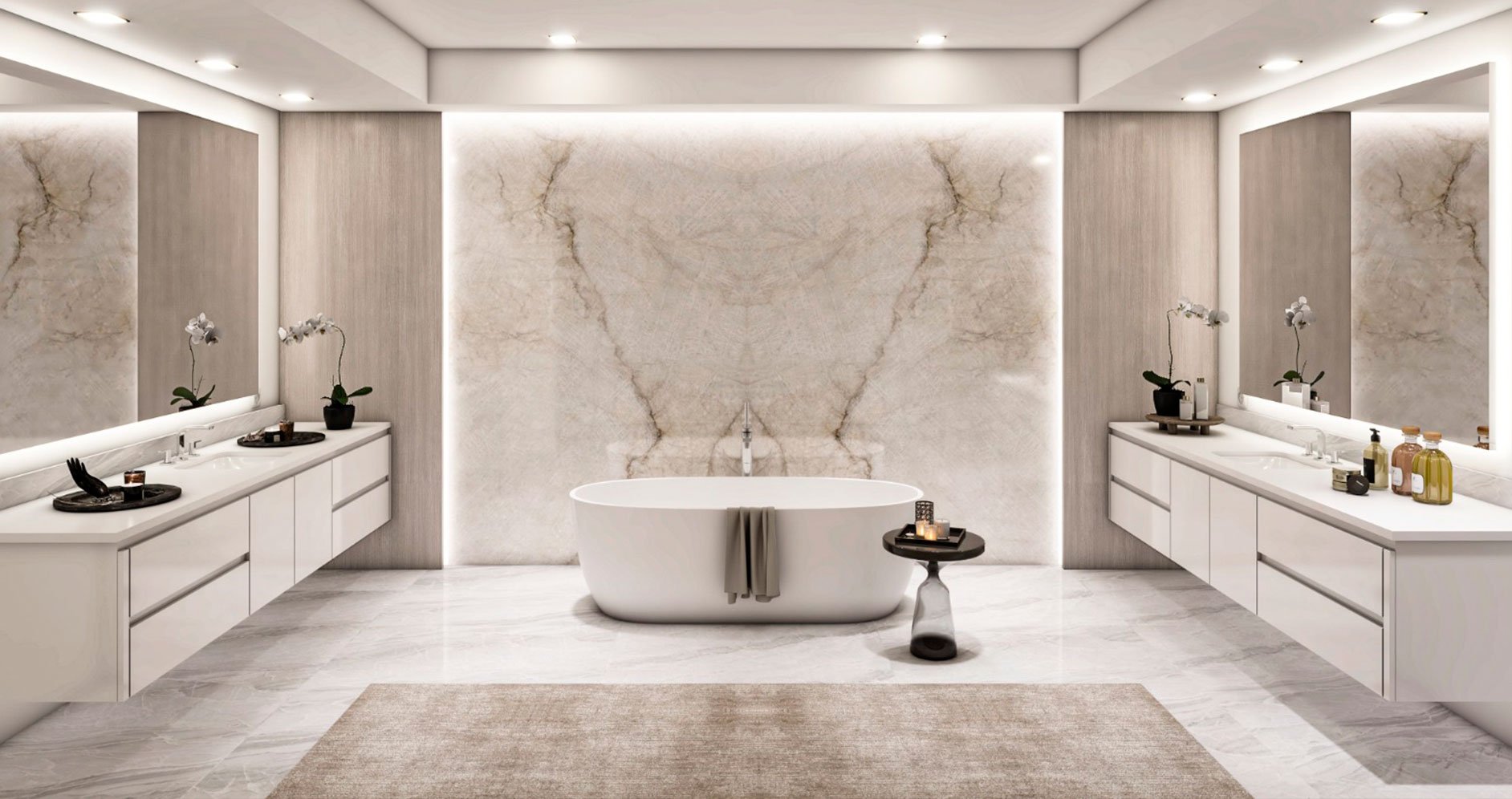 Spa-inspired primary bathroom with book-matched stone and freestanding tub