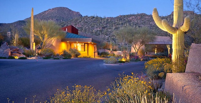 Canyon Pass at Dove Mountain guard house entry at dusk