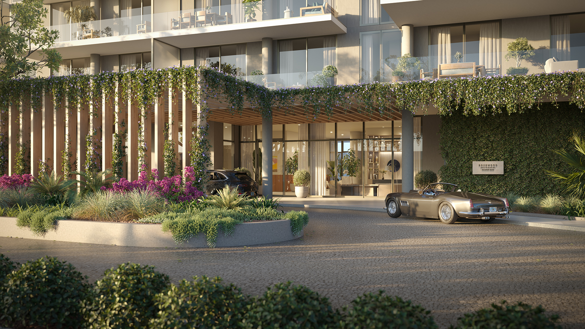 Rosewood Residences Hillsboro Beach porte-cochère arrival with lush landscaping
