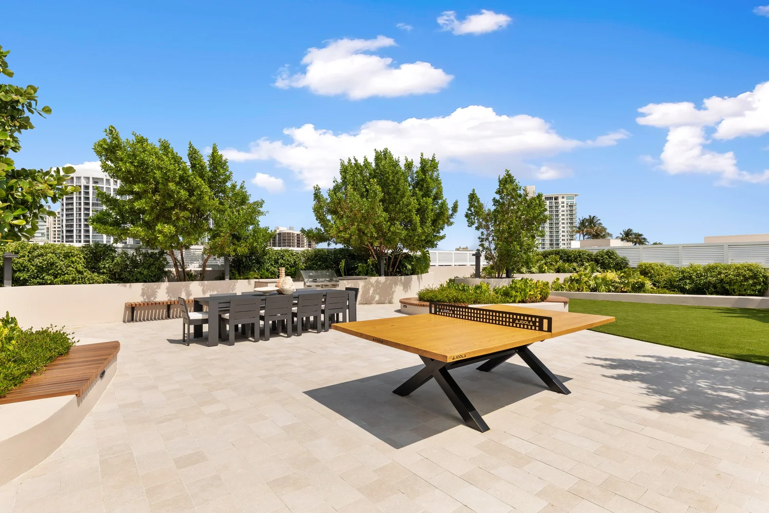 Rooftop recreation lawn and game area at Arbor Residences Coconut Grove