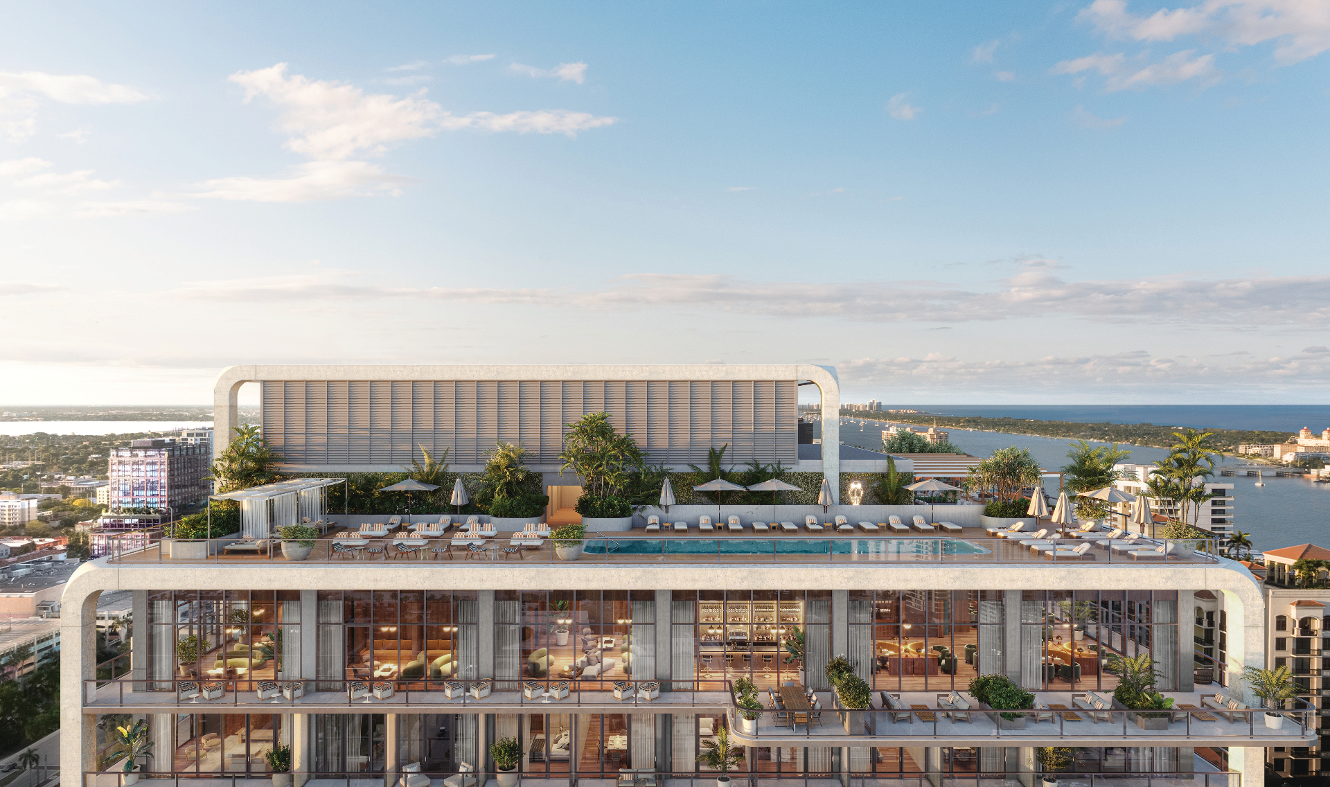 Mr. C Residences West Palm Beach rooftop pool deck and amenity level overlooking the Intracoastal
