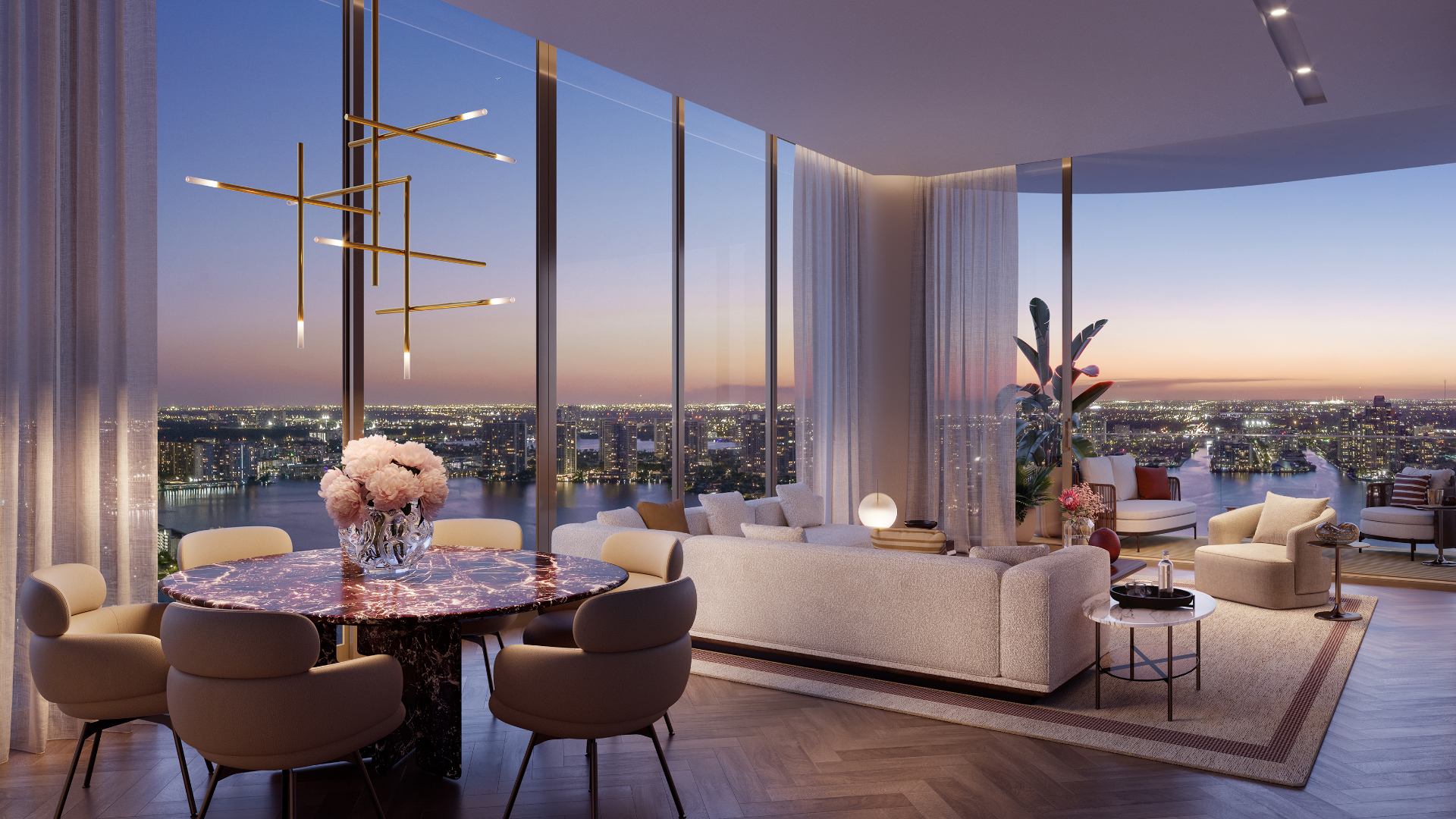 Evening living and dining room with floor-to-ceiling Intracoastal views at the St. Regis Residences, Sunny Isles Beach, Miami