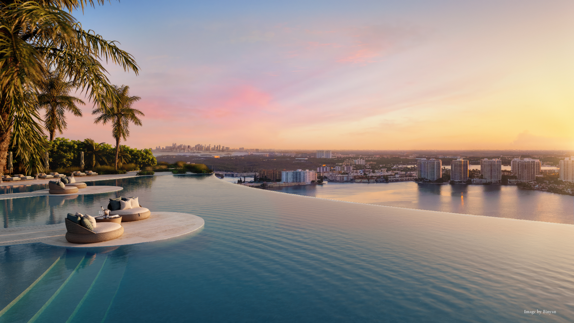 Sixth-floor Sunset Pool Deck with infinity-edge pool overlooking the bay at the St. Regis Residences, Sunny Isles Beach, Miami
