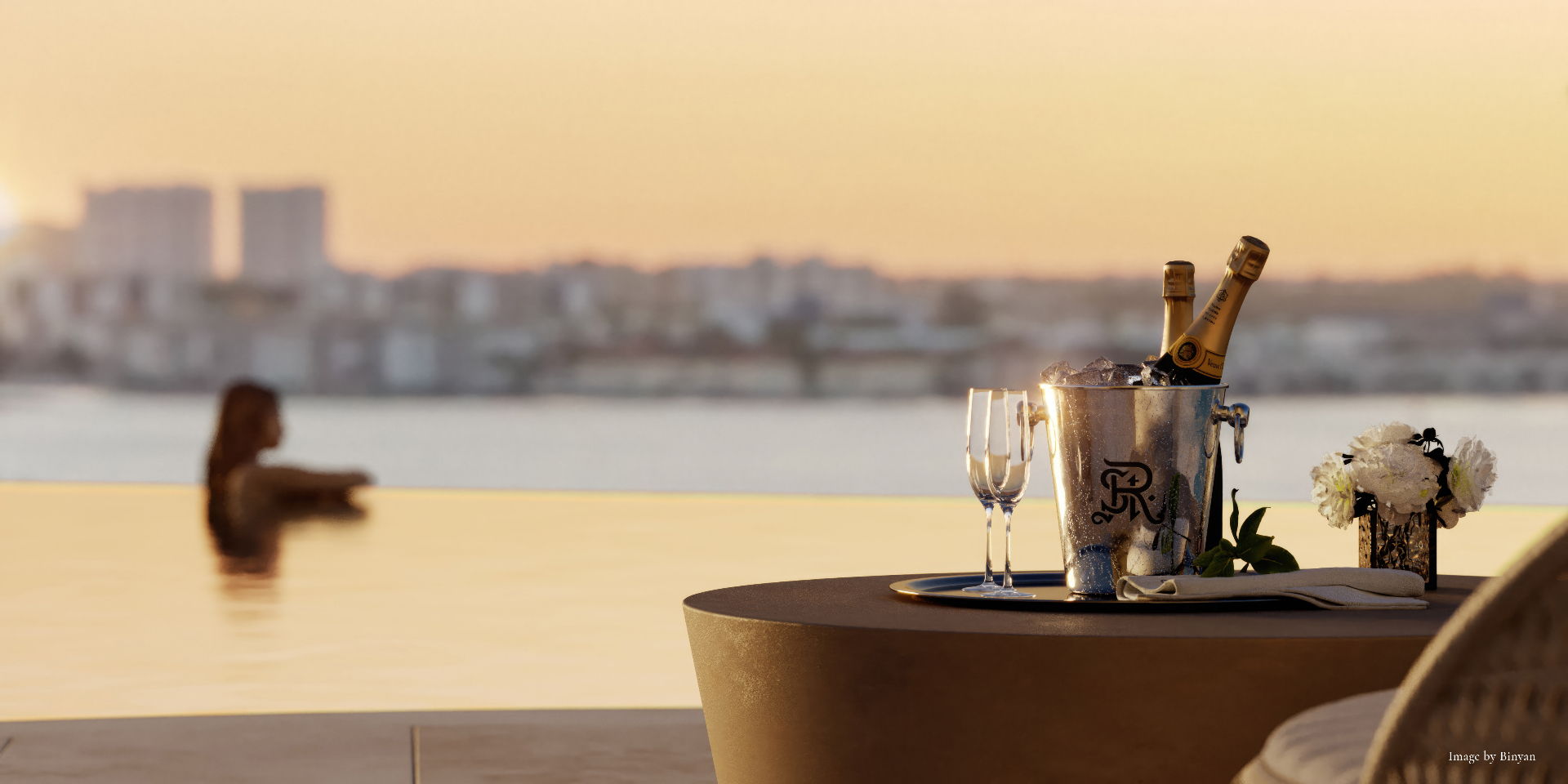 West pool sunset vignette with champagne service at the St. Regis Residences, Sunny Isles Beach, Miami