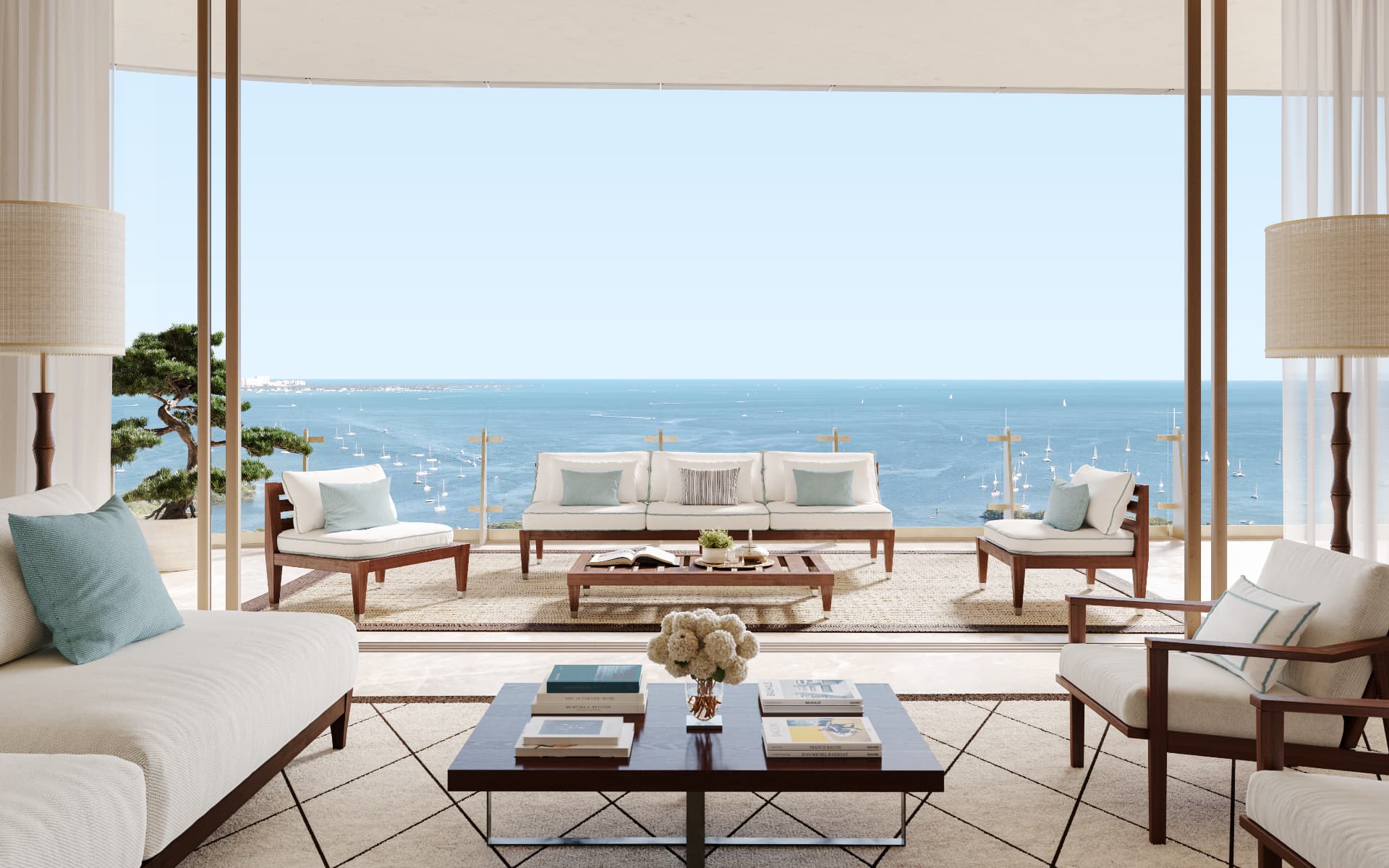 Terrace and living room overlooking Biscayne Bay at Four Seasons Private Residences Coconut Grove