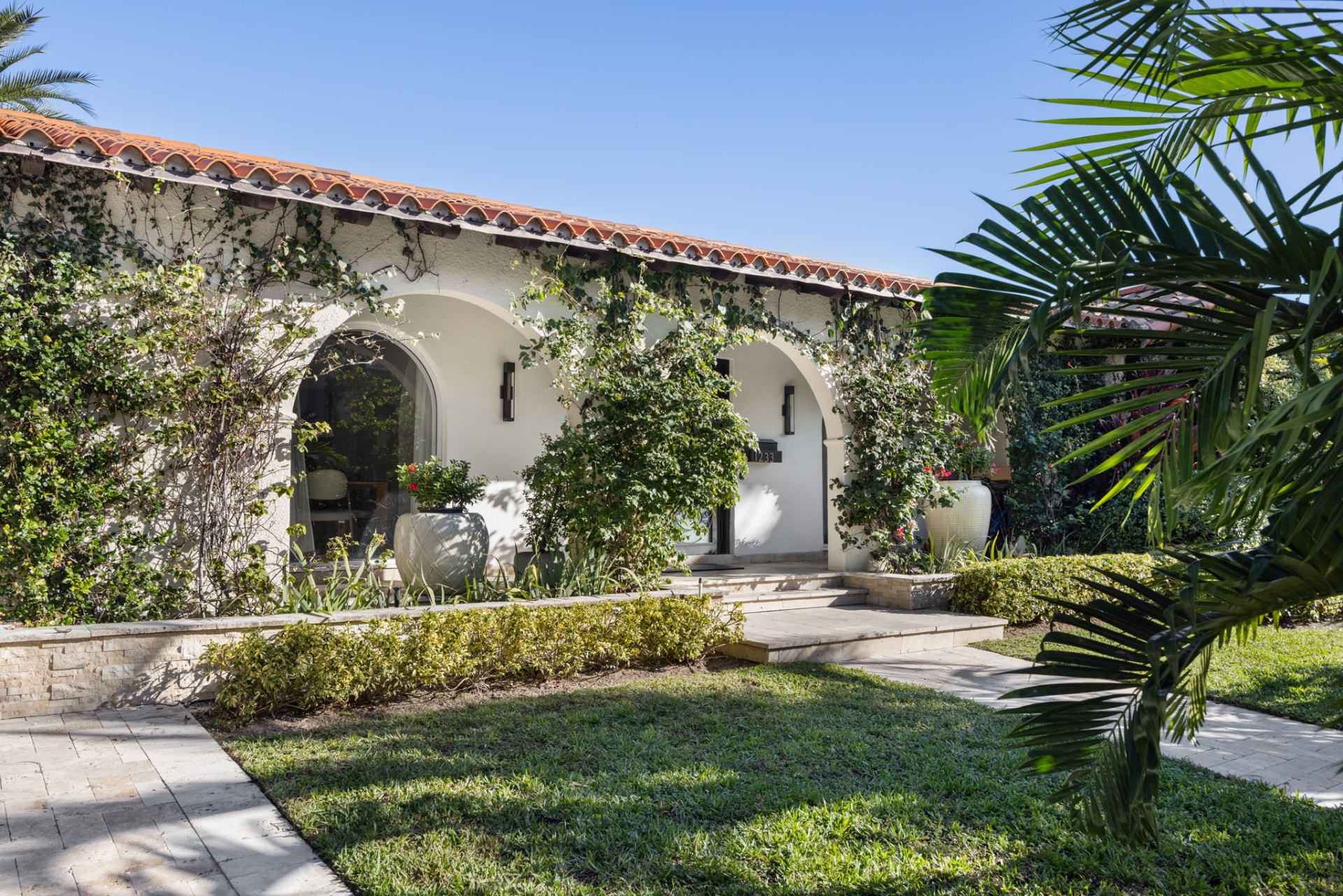 Iryna Velychko Presents a Rare Island Living Opportunity on Bay Harbor Islands' Most Desirable Interior Street